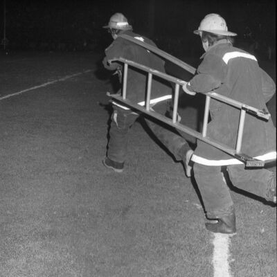 Firefighters putting out a fire, Timberline High School, October 17, 1972: Frame 4