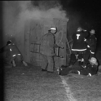 Firefighters putting out a fire, Timberline High School, October 17, 1972: Frame 10