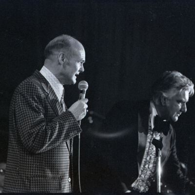 Johnny Lewis and Unidentified man, Date unknown: Frame 9a
