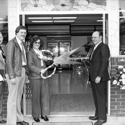 Unidentified men and Karen Fraser, Date unknown: Frame 7a