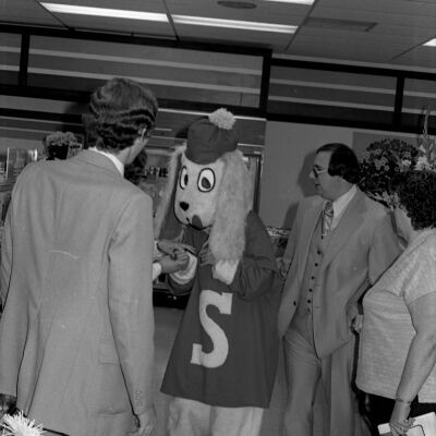Unidentified people and Unidentified mascot, Date unknown: Frame 39