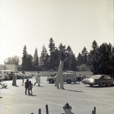 Unidentified man on stilts, St. Martin's campus, 1976: Frame 24d