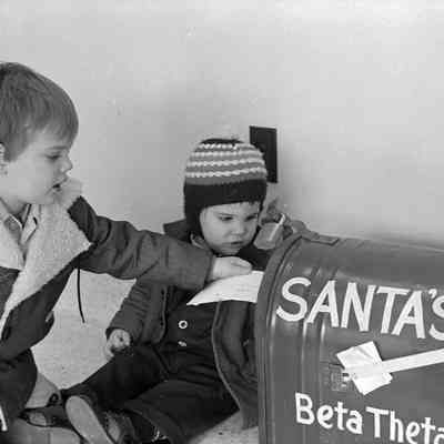 Unidentified boys, December 3, 1975: Frame 2