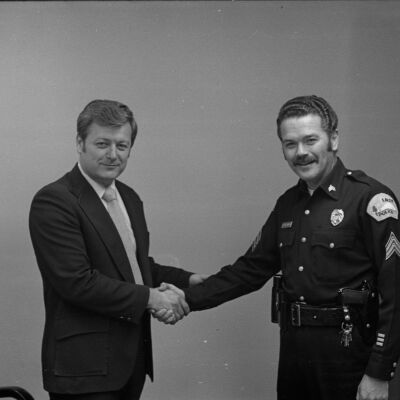 John Mansfield and Unidentified police officer, Date unknown: Frame 20