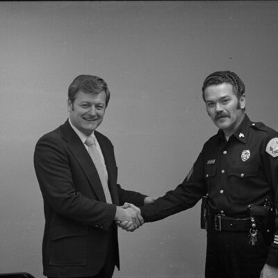 John Mansfield and Unidentified police officer, Date unknown: Frame 21