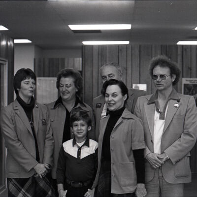Unknown Boy with Century 21 Employees, Unknown Date