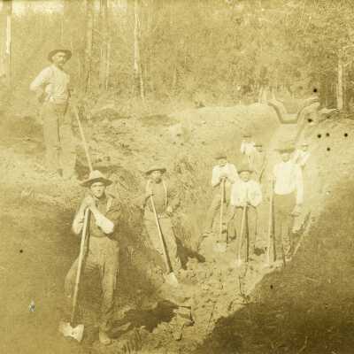 Crew Hand-Digging Drainage Ditch from Chambers Lake to Deschutes River
