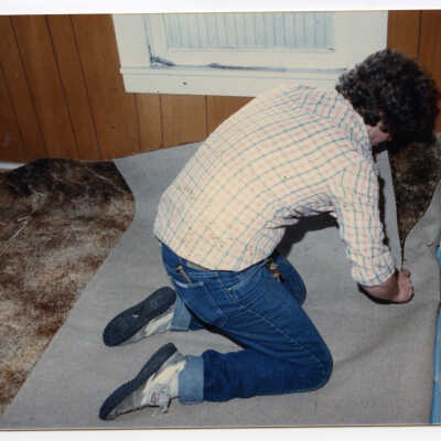 Cutting Carpet in Gallagher House, c. 1986