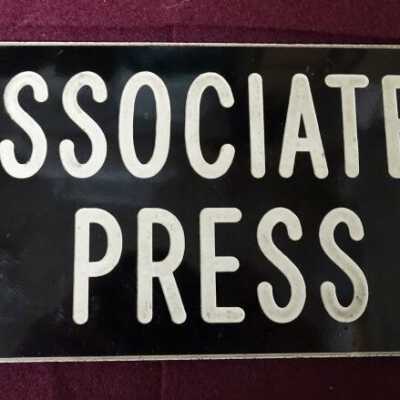 Associated Press Sign