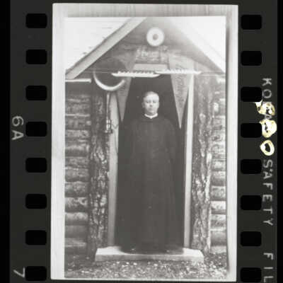 Father Sebastian Ruth at KGY log cabin