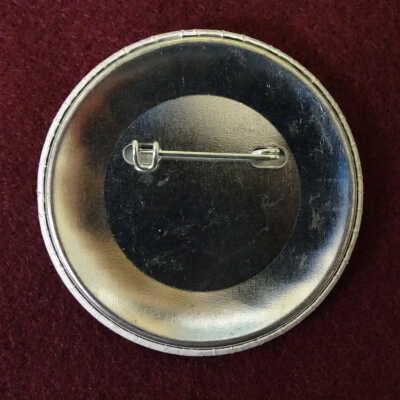 Tumwater Sesquicentennial button: Photo by Lacey Museum