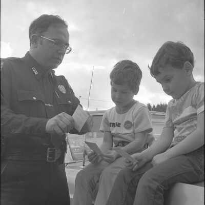 Policeman Trading Baseball Cards: Frame 24