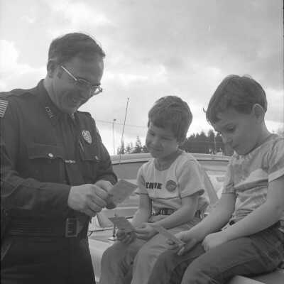 Policeman Trading Baseball Cards: Frame 25