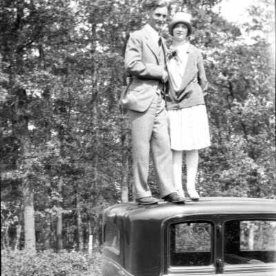 Shafley Family Standing on Cars
