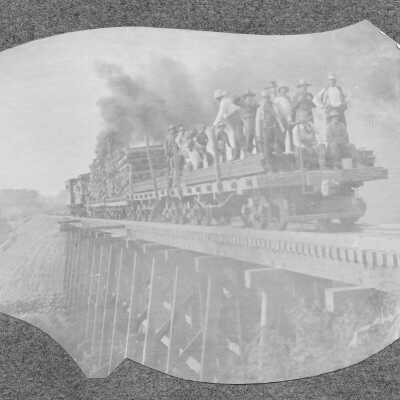 Interurban Locomotive and Work Crew on Trestle