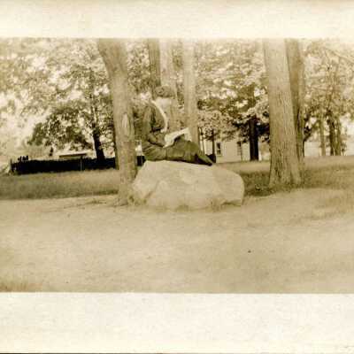 Unidentified woman on rock