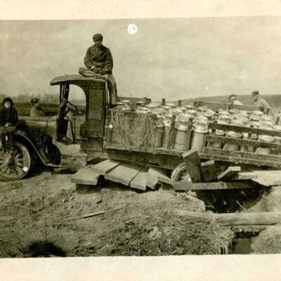 Milk Truck Through Bridge