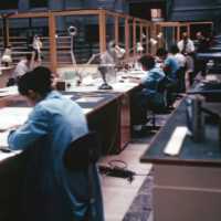 Scan of a slide showing a row of conservators