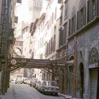 Scanned photo showing a street with supports