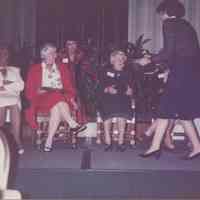 Photo of Stella Patri receiving a plate