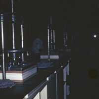 Scan of a slide showing a line of presses