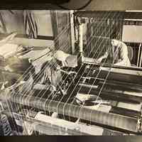 Photo of Ernie and Gladys Holbeach operating a ledger ruler