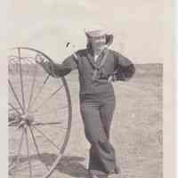 Photo of Stella Patri standing net to a wheel