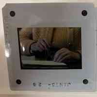 Patri showing how to sew a text block.