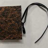 Handmade miniature book - black spine, bronze-colored paper cover, black ribbon ties