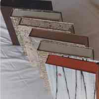 Photo of six standing drop spine boxes