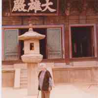 Patri in front of a Japanese building