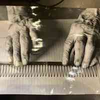 Photo of Ernie Holbreach showing dredge pens