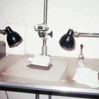 Scan of a slide showing a workstation setup