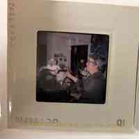 Patri with a cat standing on a hand press