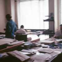 Scan of a slide of conservators at work