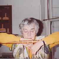 Photo of Stella Patri at a sewing frame