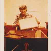 Photo of Stella Patri Holding up a frame