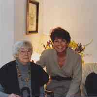 Stella Patri sitting next to a woman