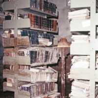 Scan of a slide showing full book shelves