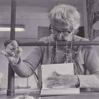 Patri at a sewing frame