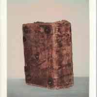 Photo of a standing book with metal elements