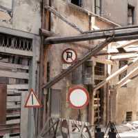 Scanned photo showing a building being supported.