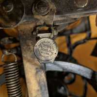          Veeder Mfg. Co. part- probably a counter
   