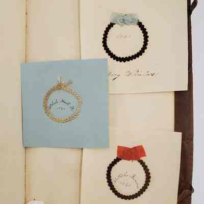 Amy Hall Williams Hair Album 1834-1844: Hair samples from: Mary Whislars 1840; Phebe Hall Jr. 1840 "mother"; Lettisha Famous 1840, red bow