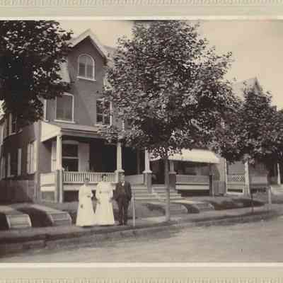 Elwood and Amy Ida Glisson and Abbie Gilbert at their home 333 Dean Street, West Chester, PA.: front of photograph with frame/mount - (left to right) Amy Ida Glisson, Abbie Gilbert, Elwood Glisson