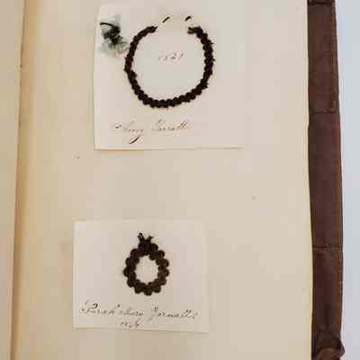 Amy Hall Williams Hair Album 1834-1844: Hair samples from: Amy Garrett 1841; Sarah Mary Yarnall 1840