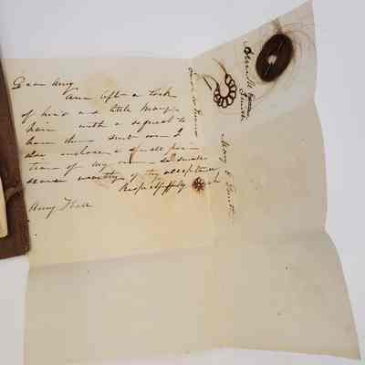 Amy Hall Williams Hair Album 1834-1844: Dear Amy, Ann [unintelligible] a lock of her's and little Mary's hair with a request to have them sent [unintelligible] I also enclose a small portion of my own [...] worthy of thy acceptance. Respectfully Sarah [Evans]. 
Hair samples from Sarah Evans, Mary Smith and Ann Smith