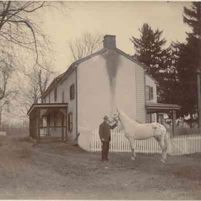 Local Families Photograph Collection/Elwood and Amy Ida Glisson’s house and horse on the farm. “We moved there March 25th 1890”)