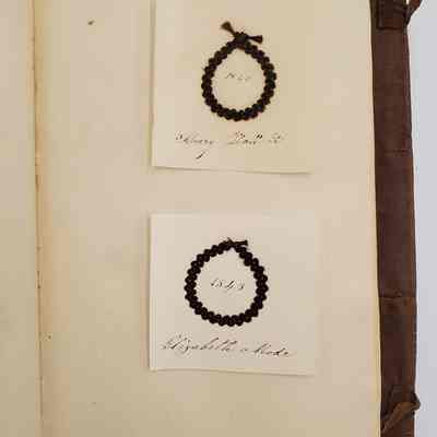 Amy Hall Williams Hair Album 1834-1844: Hair Samples from: Mary Hall Jr. 1840 "aunt"; Elizabeth Mode 1843 "aunt"