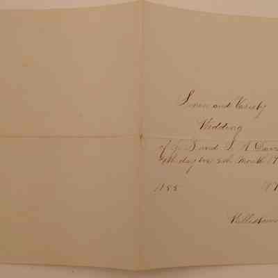 4. Invitation to the Wedding of J.B. and L.A. Davis (1/2): Invitation to "Linen and Variety Wedding of J.B. and L.A. Davis" in Willistown on May 19 1875[?]. "Royal Irish Linen Marcus Ward & Co" visible under light.